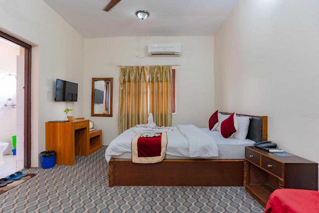 Postel nebo postele na pokoji v ubytování Siddhartha Resort, Chisapani