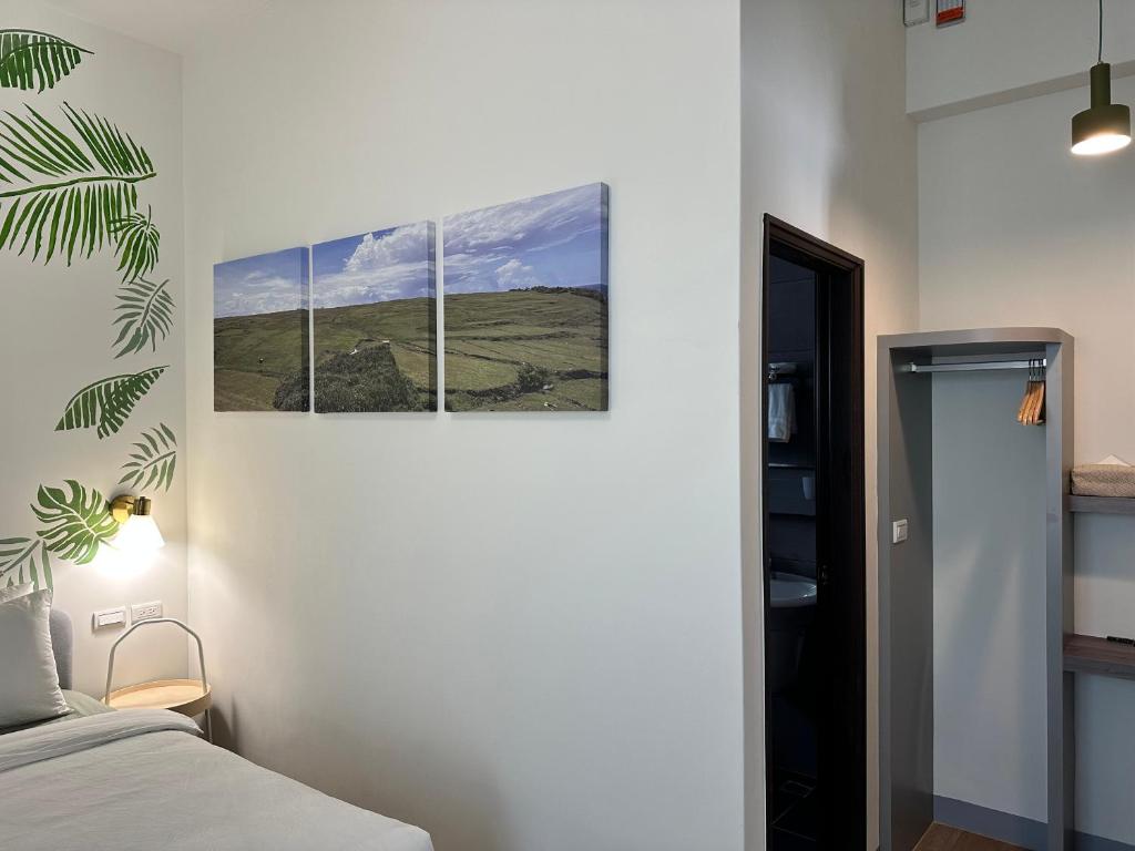 Postel nebo postele na pokoji v ubytování WinXin House