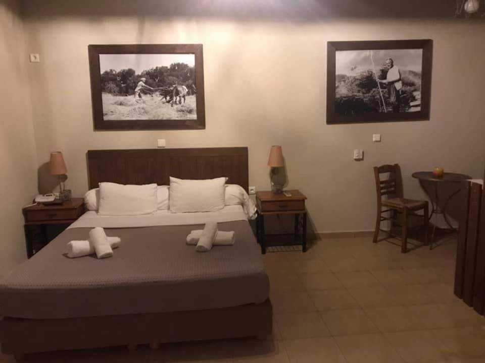 Postel nebo postele na pokoji v ubytování Guesthouse Axieros