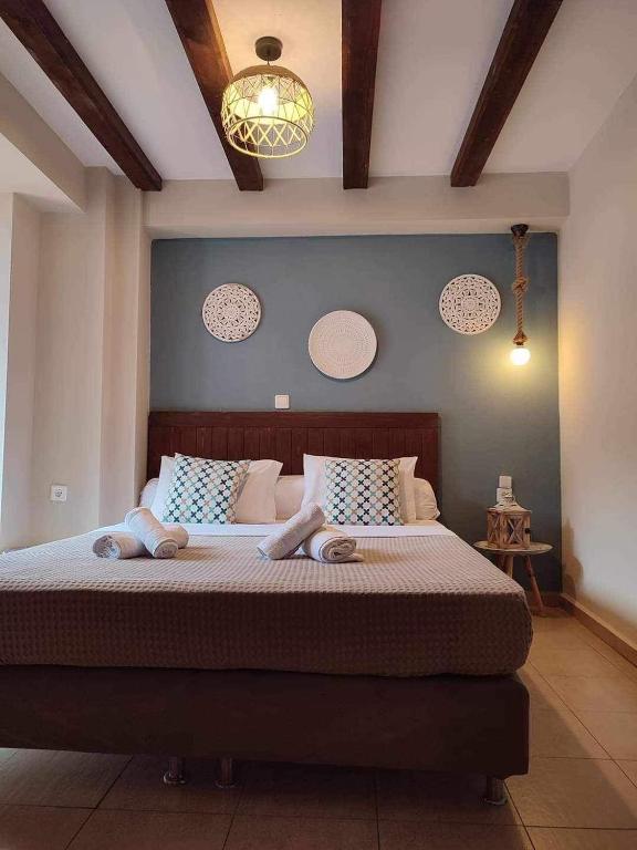 Postel nebo postele na pokoji v ubytování Guesthouse Axieros