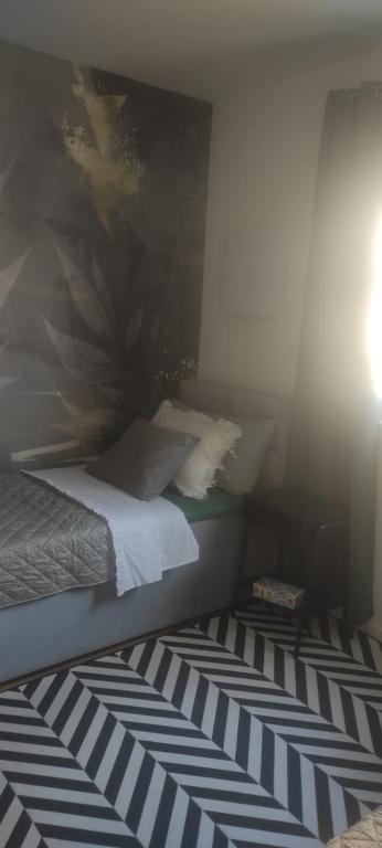 Postel nebo postele na pokoji v ubytování Geek Penthouse