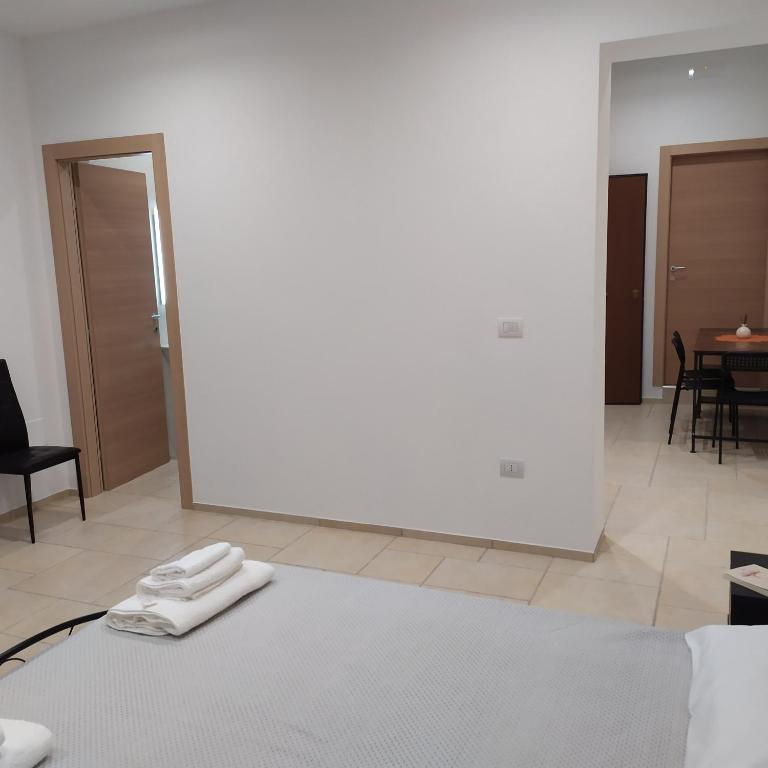 Łóżko lub łóżka w pokoju w obiekcie STRADONE 132