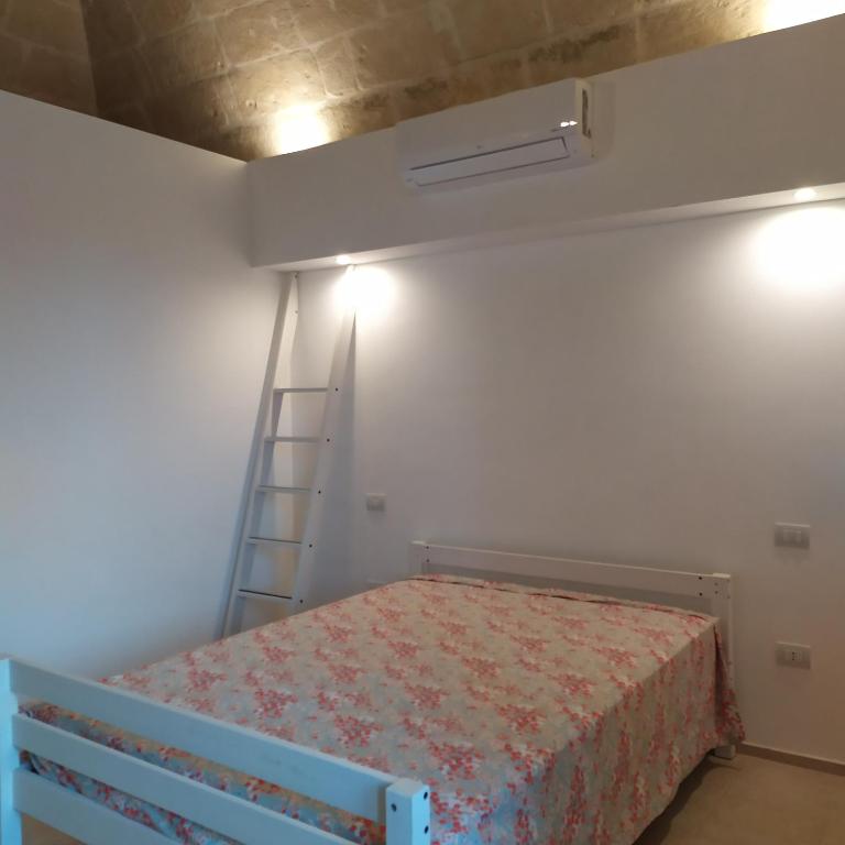 Łóżko lub łóżka w pokoju w obiekcie STRADONE 132