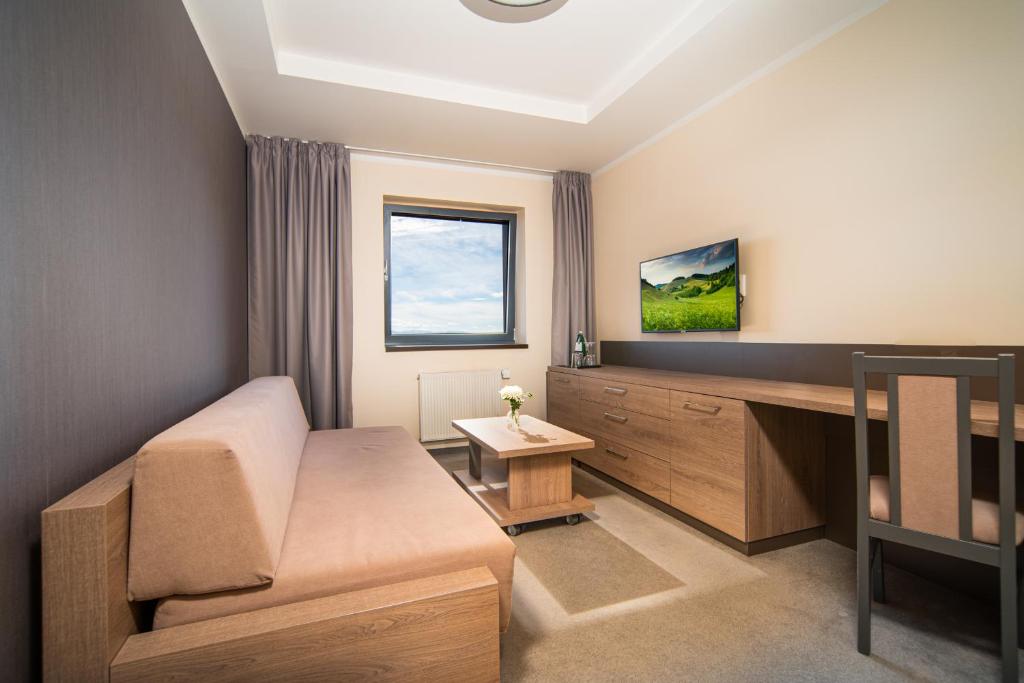 TV a/nebo společenská místnost v ubytování Hotel Panorama Resort
