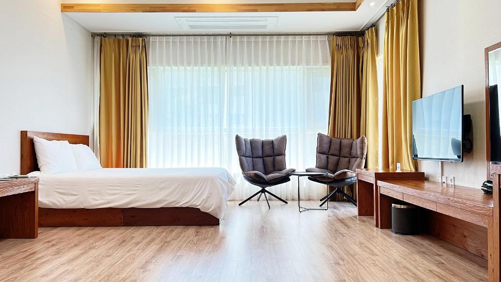 TV a/nebo společenská místnost v ubytování Hotel Sweet Castle Jeju Hamdeok