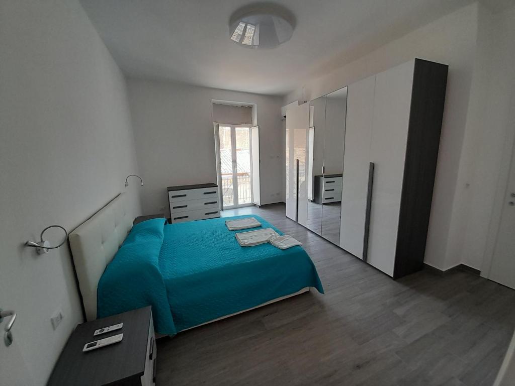 Postel nebo postele na pokoji v ubytování Fuori Ortigia room 1