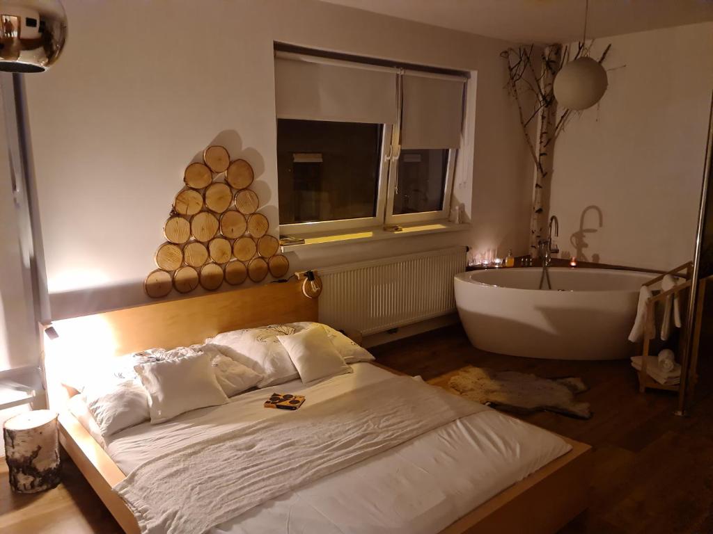 Postel nebo postele na pokoji v ubytování City Centre Apartments