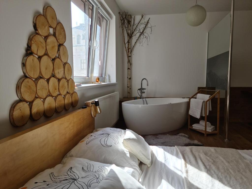 Postel nebo postele na pokoji v ubytování City Centre Apartments