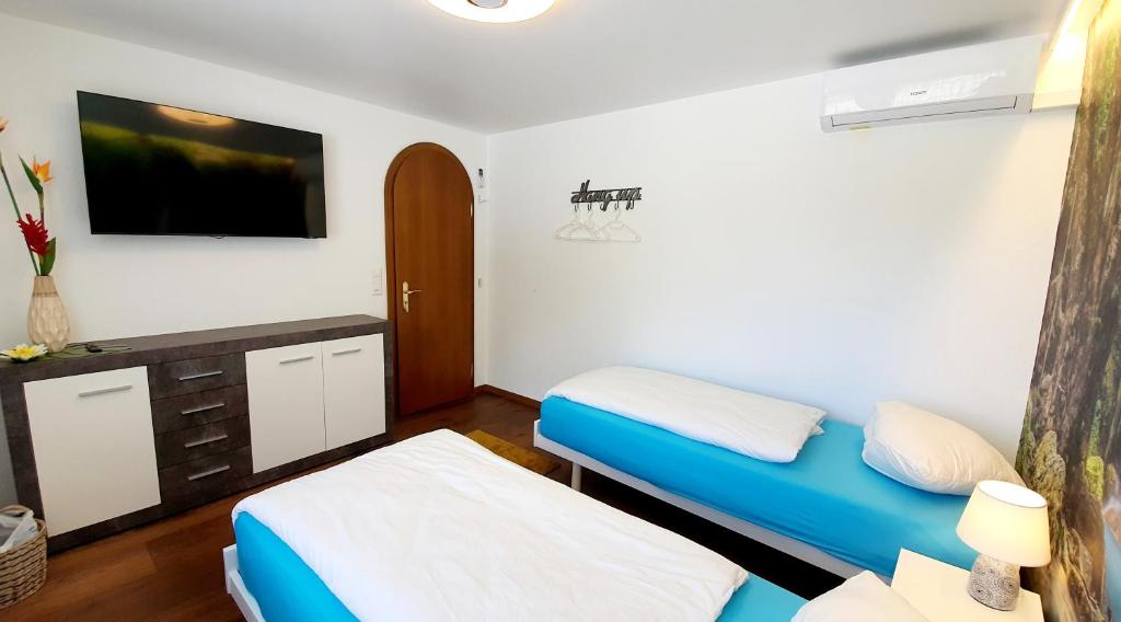 Postel nebo postele na pokoji v ubytování Luxuriöse Villa Romantica