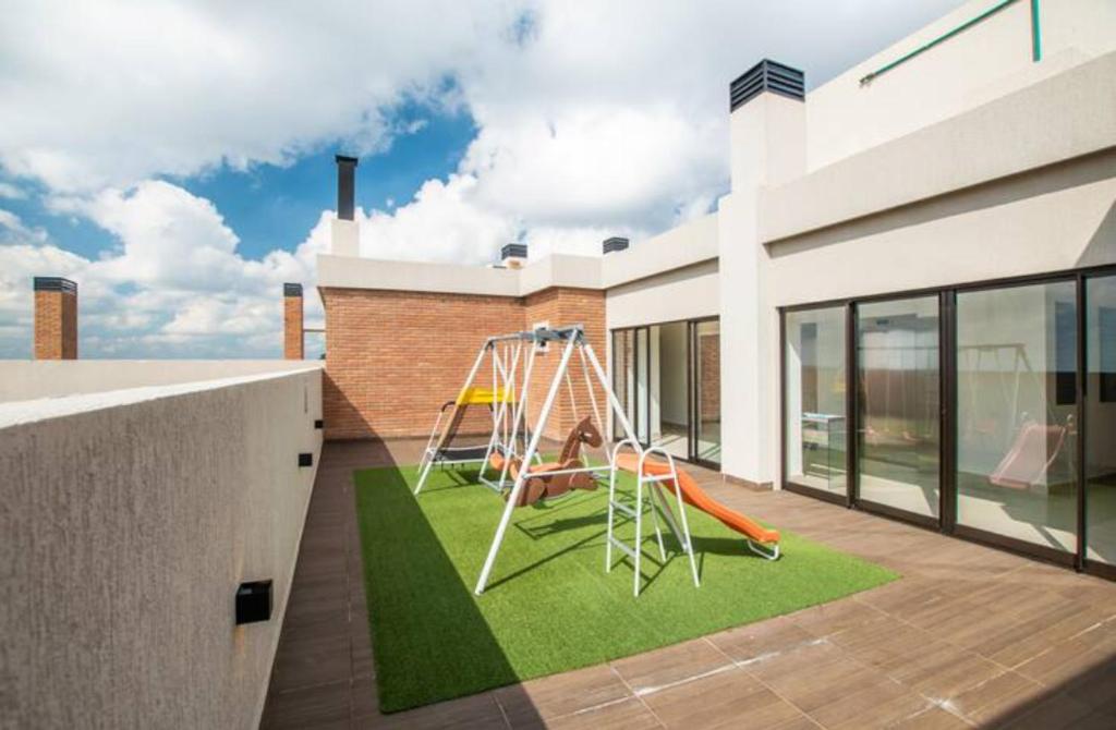 Zona de joacă pentru copii de la Delicado Monoambiente-comfy Studio