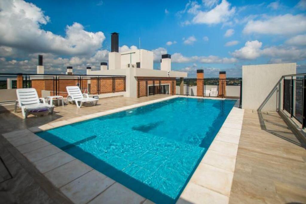 Piscina de la sau aproape de Delicado Monoambiente-comfy Studio