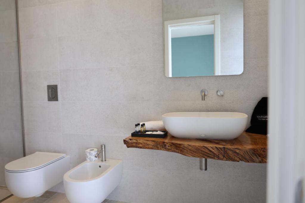 Koupelna v ubytování Suites Dimora Garibaldi