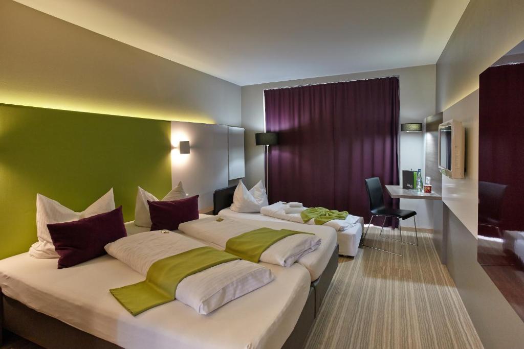 Postel nebo postele na pokoji v ubytování Hotel Demas City