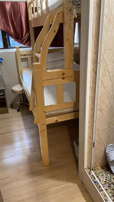 Postel nebo postele na pokoji v ubytování 泰豪賓館