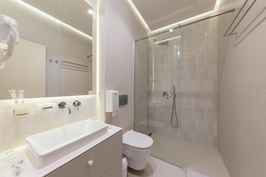 Koupelna v ubytování ММ GROUP APARTMENT