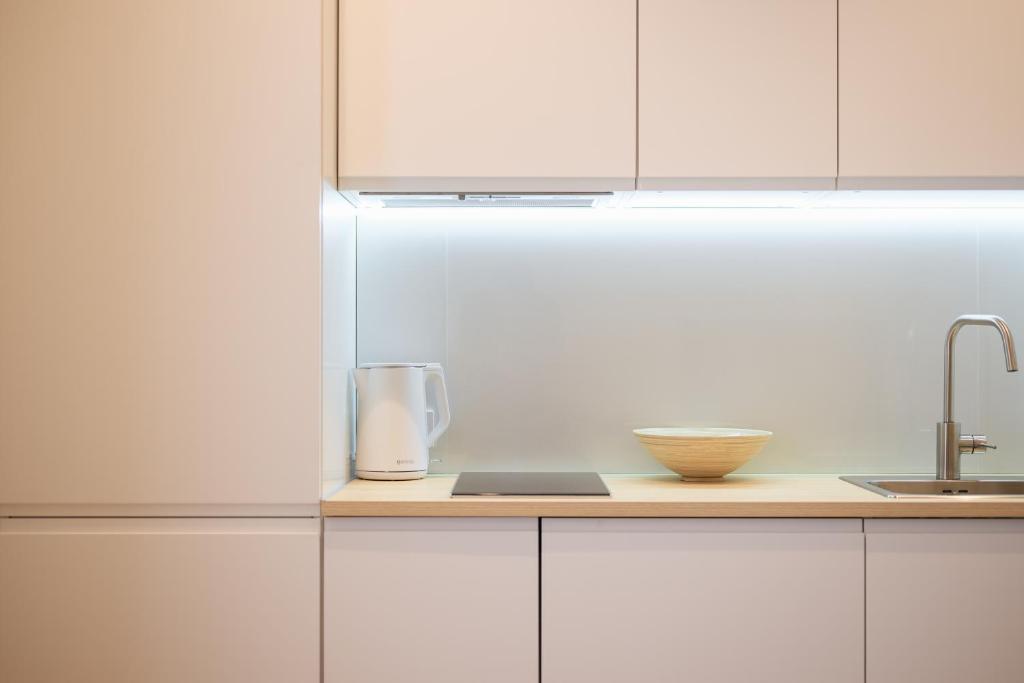 Kuchyň nebo kuchyňský kout v ubytování ММ GROUP APARTMENT