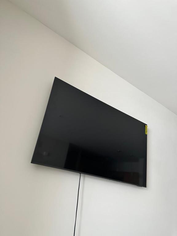 TV a/nebo společenská místnost v ubytování CozY