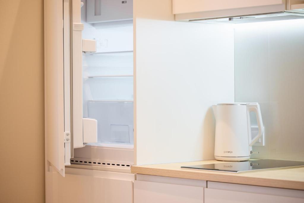 Kuchyň nebo kuchyňský kout v ubytování ММ GROUP APARTMENT