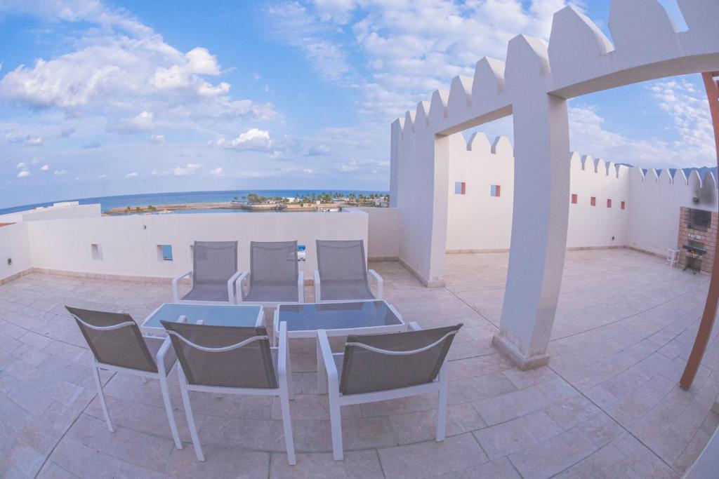 Balkón nebo terasa v ubytování Le Sifah - Marina View Apartments & Villa