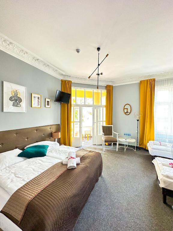 Postel nebo postele na pokoji v ubytování Expolis Residence - City Center MTP TARGI - 24h #betterthanyourEX