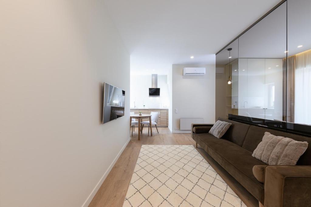 TV a/nebo společenská místnost v ubytování ММ GROUP APARTMENT