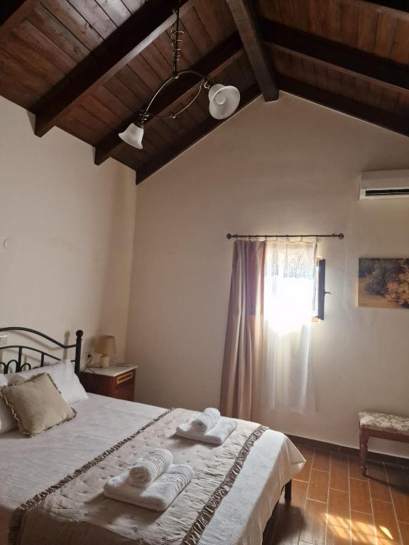Letto o letti in una camera di Villa Penelope