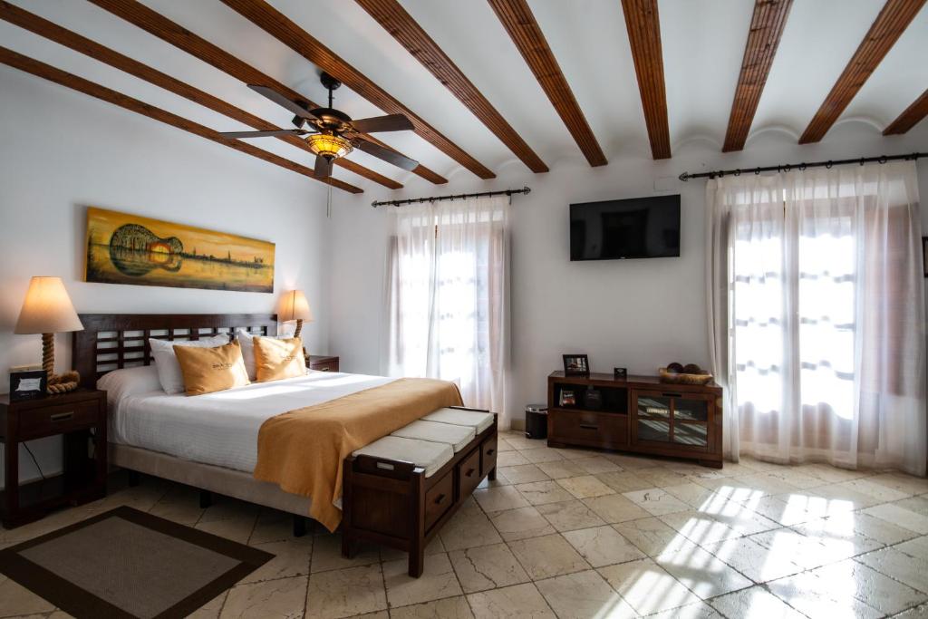 Postel nebo postele na pokoji v ubytování Entre Dos Aguas Hotel Boutique