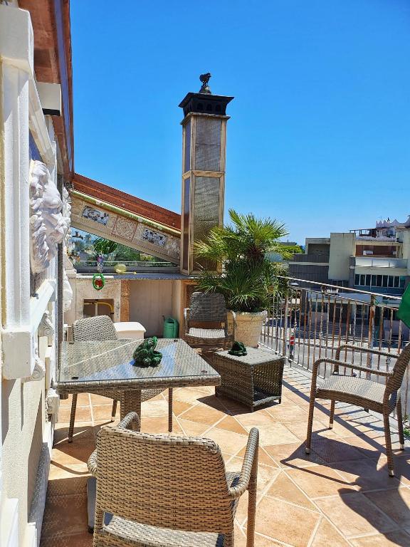 A balcony or terrace at CASSIODORO SUITE B&B