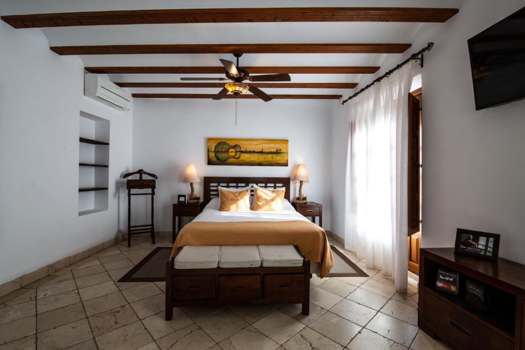 Postel nebo postele na pokoji v ubytování Entre Dos Aguas Hotel Boutique