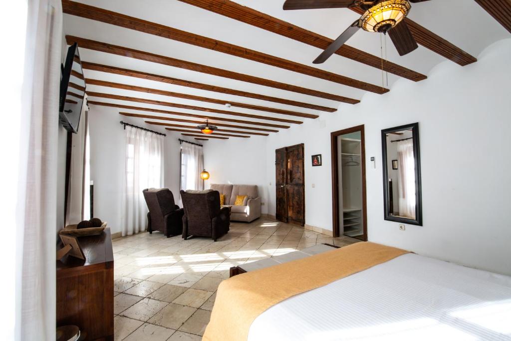 Postel nebo postele na pokoji v ubytování Entre Dos Aguas Hotel Boutique