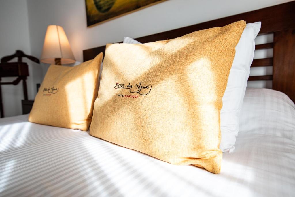 Postel nebo postele na pokoji v ubytování Entre Dos Aguas Hotel Boutique