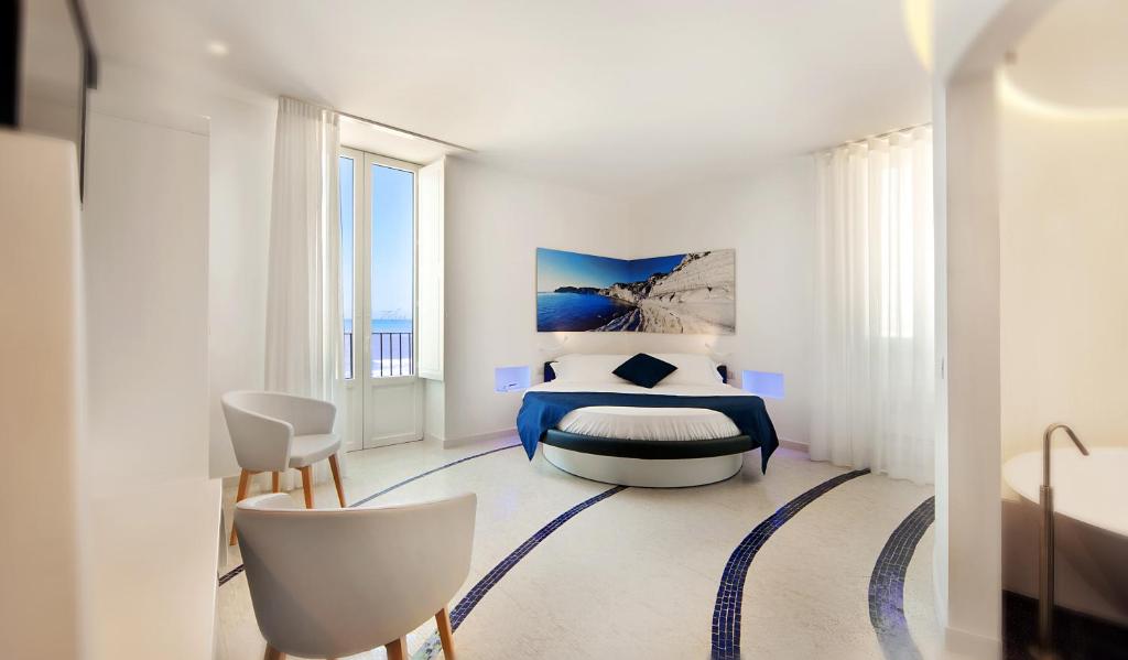 Posteľ alebo postele v izbe v ubytovaní Zafran Boutique Hotel