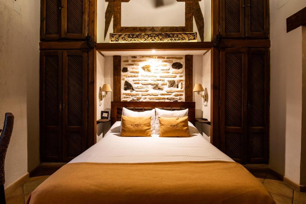 Postel nebo postele na pokoji v ubytování Entre Dos Aguas Hotel Boutique
