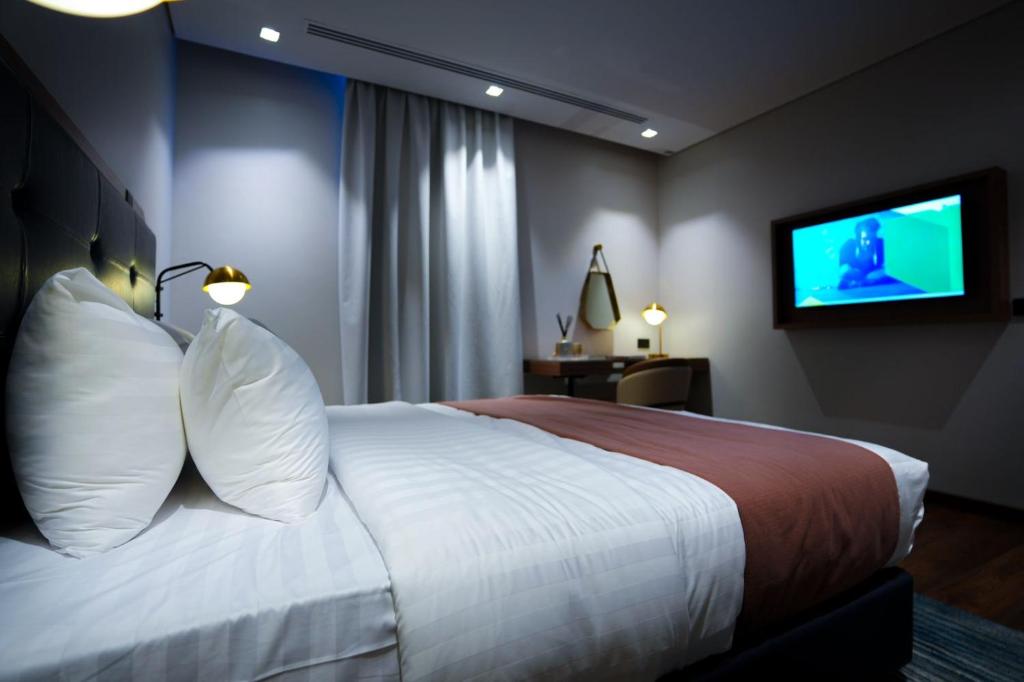 TV a/nebo společenská místnost v ubytování NAS Hotel