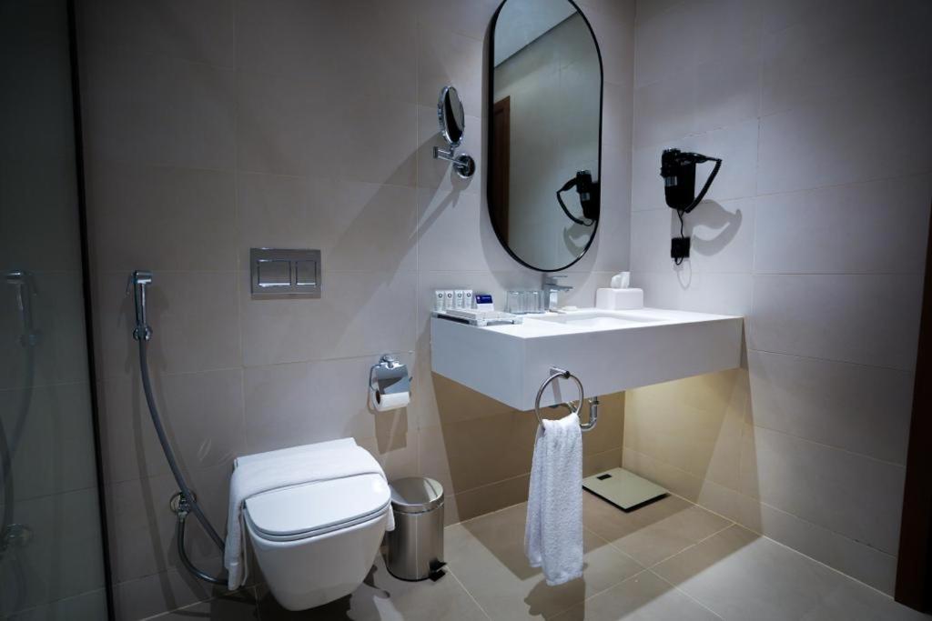 Koupelna v ubytování NAS Hotel