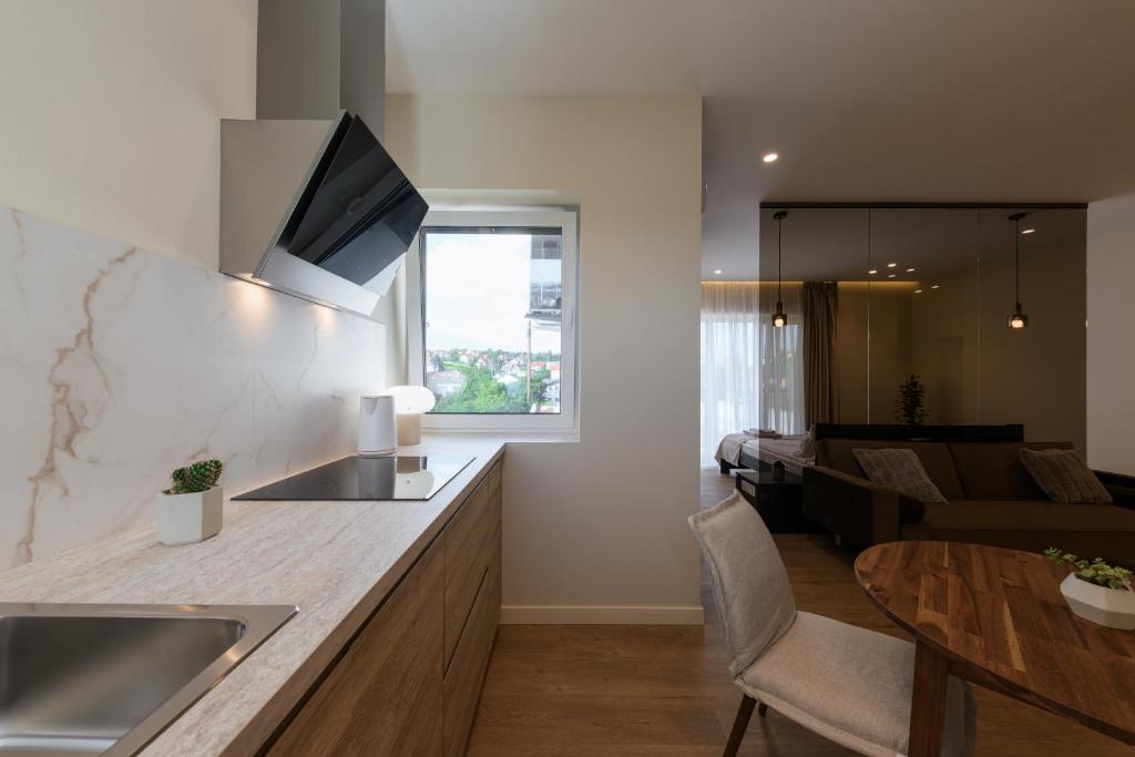 Kuchyň nebo kuchyňský kout v ubytování ММ GROUP APARTMENT