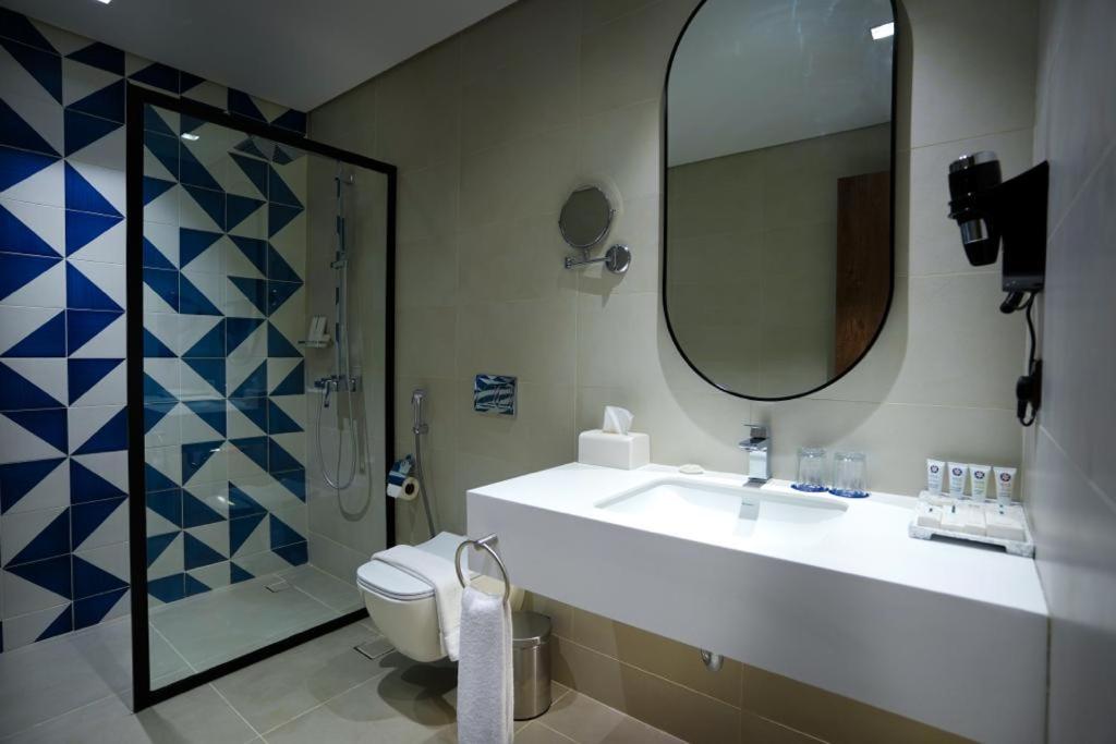 Koupelna v ubytování NAS Hotel