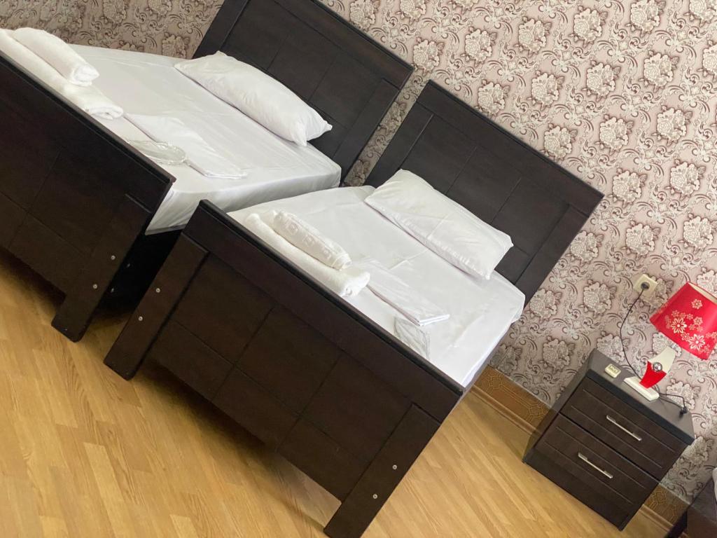 Postel nebo postele na pokoji v ubytování Hotel Mariana