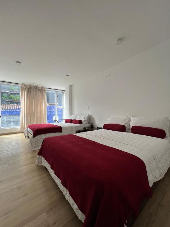 Postel nebo postele na pokoji v ubytování Hotel Florencia Plaza