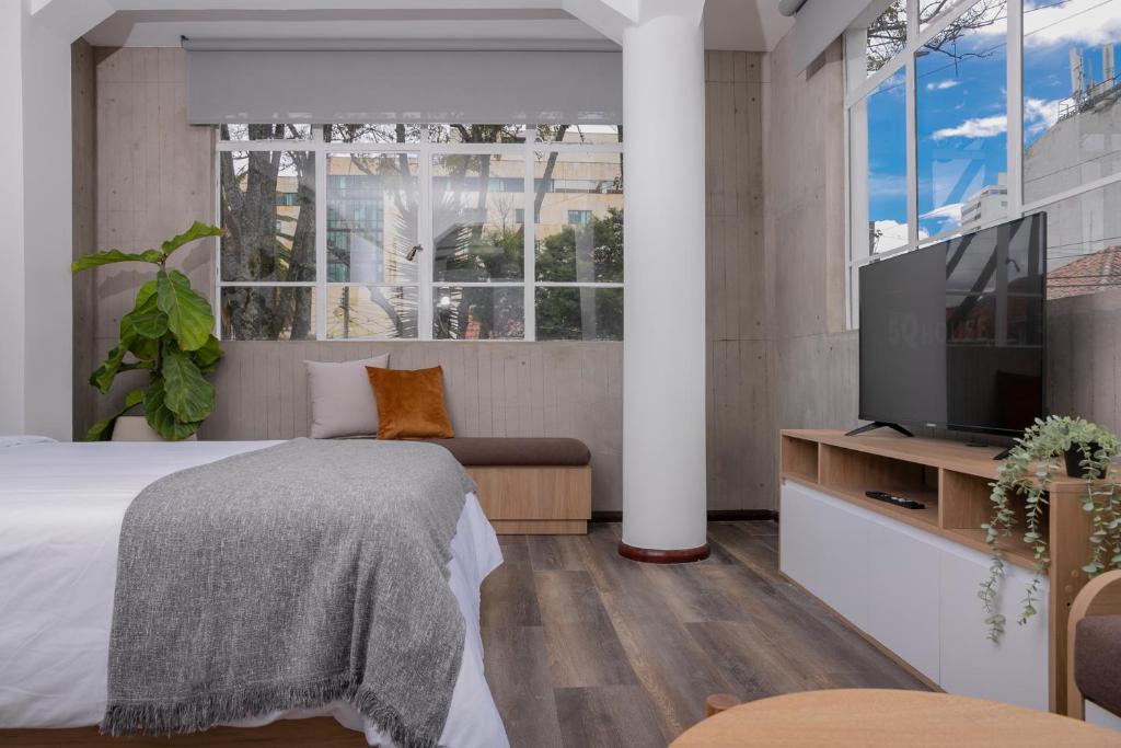 TV a/nebo společenská místnost v ubytování 5Q House Quinta Camacho