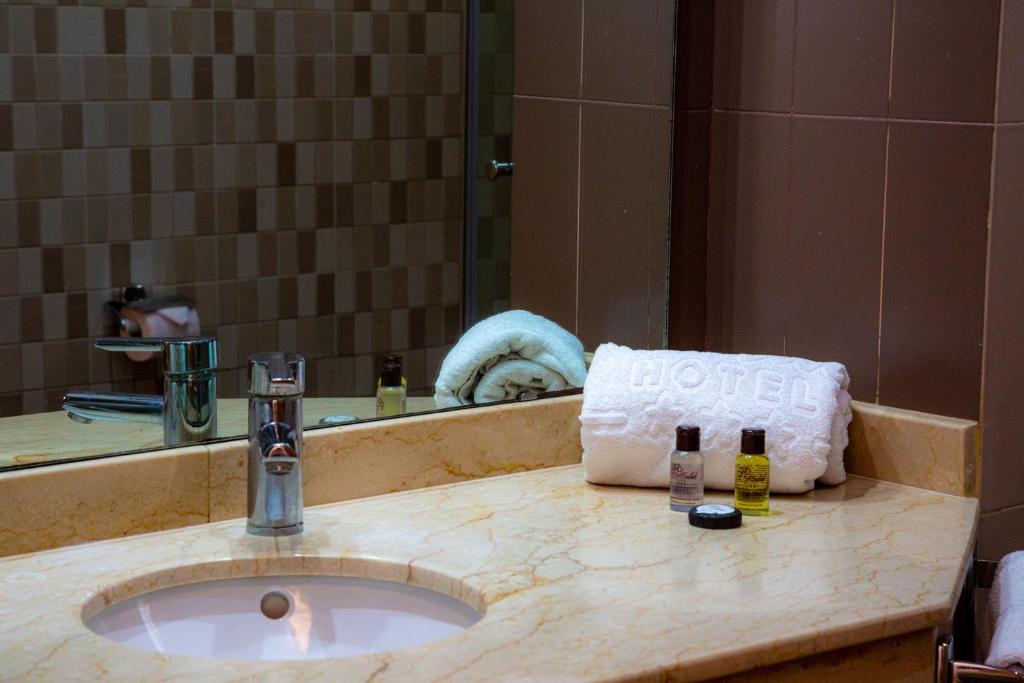 Koupelna v ubytování Malak Hotel