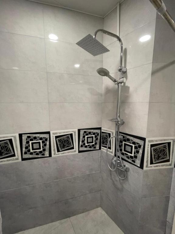 Koupelna v ubytování AA Hotel