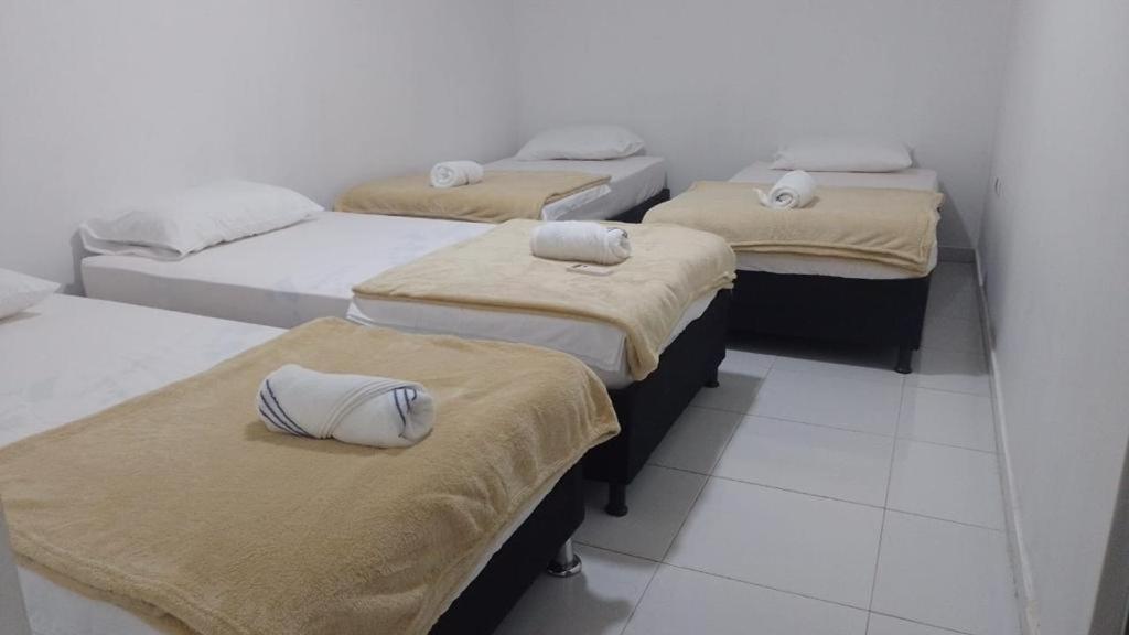 Letto o letti in una camera di Guajira Sunset Hostal