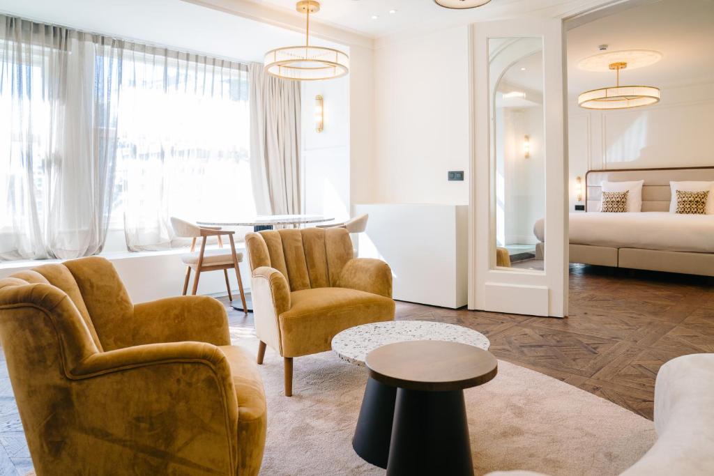 Postel nebo postele na pokoji v ubytování Hotel Du Parc