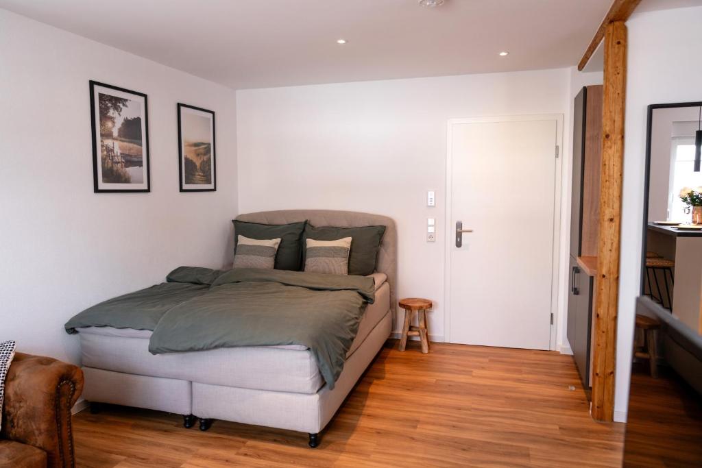 Postel nebo postele na pokoji v ubytování Exklusives Apartment in bester Lage in TBB