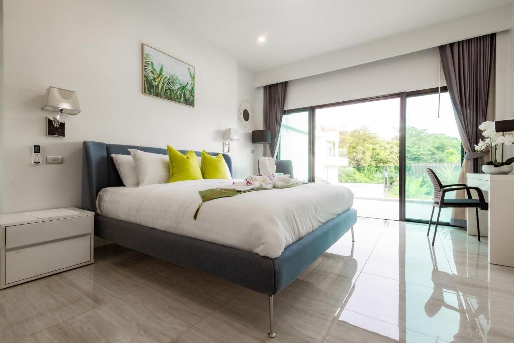 Postel nebo postele na pokoji v ubytování Koh Chang Luxury Pool Villas