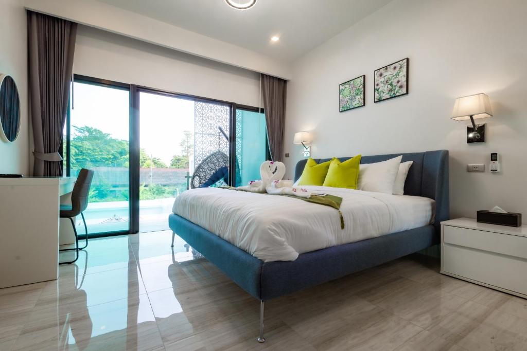 Postel nebo postele na pokoji v ubytování Koh Chang Luxury Pool Villas
