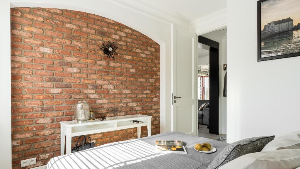 Posteľ alebo postele v izbe v ubytovaní Apartament Ap94