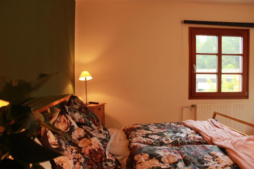 Postel nebo postele na pokoji v ubytování Ferienwohnung CONNI