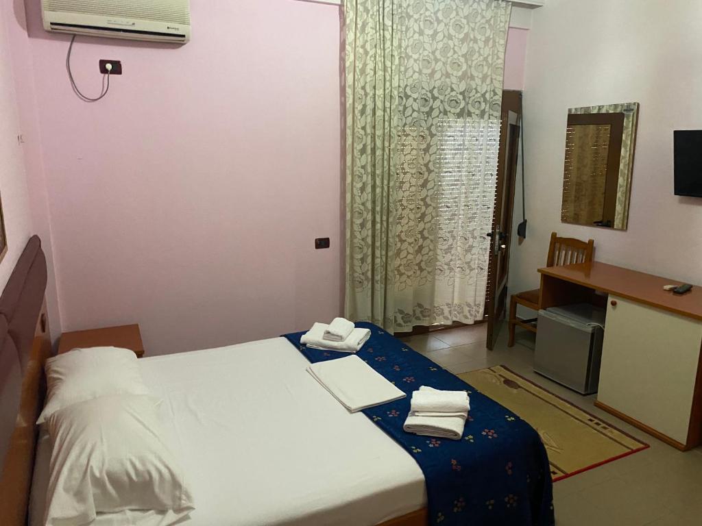 Postel nebo postele na pokoji v ubytování Hotel Edland